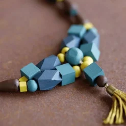 ARTEMIO - 25 perles en bois gouttes 18 x 12 mm